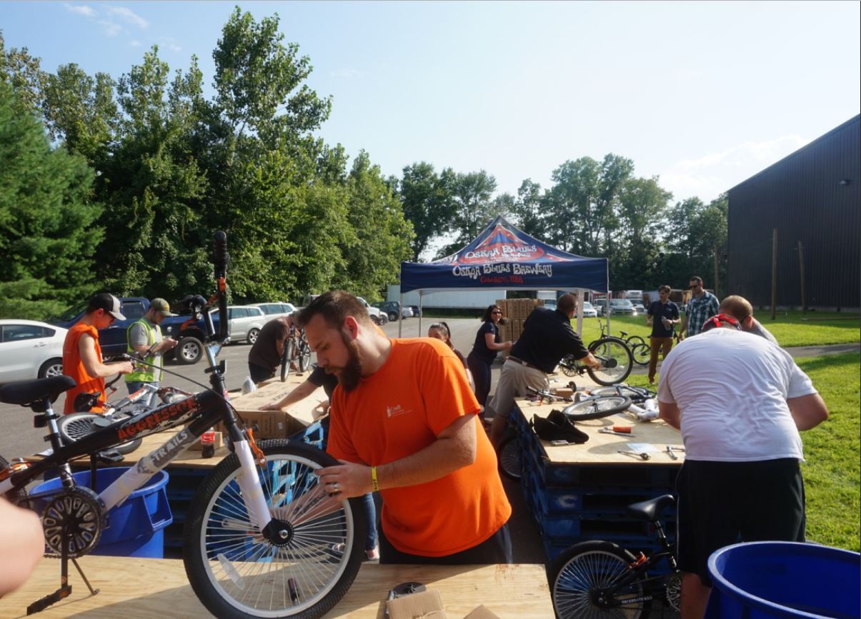 Employees building bikes