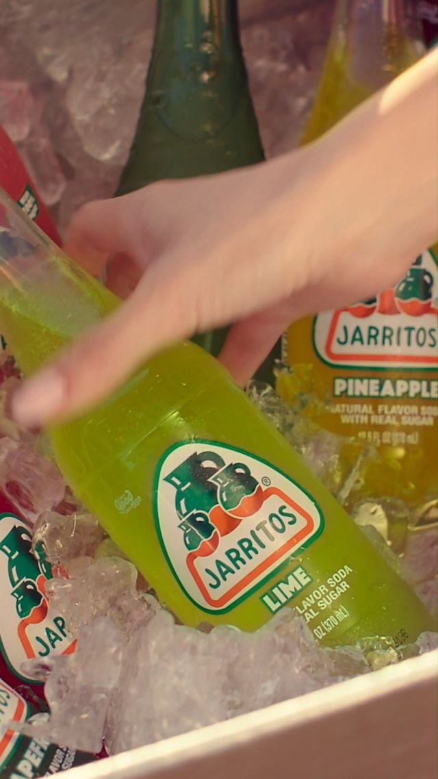 There’s little doubt you’ve seen them — clear glass bottles filled with liquid refreshment in eye-catching, mouth-watering shades of orange, green, yellow and red. Chances are you’ve tried one as well, and maybe even a flavor (Guava? Mango?) you never imagined would make sense in soda form. Either way, you’ve encountered a brand that has carved out more than a niche in the crowded soda marketplace, and whose appeal cuts across traditional demographic categories: Jarritos.

From mandarin to guava to watermelon, Jarritos’ innovative flavors and cheery colors set the brand apart from traditional sodas. Many consumers also find Jarritos to be more refreshing than your average soda thanks to the company’s commitment to using only natural sugars (no high fructose corn syrup here) and flavors.

Jarritos is available for sale now! 

@jarritos